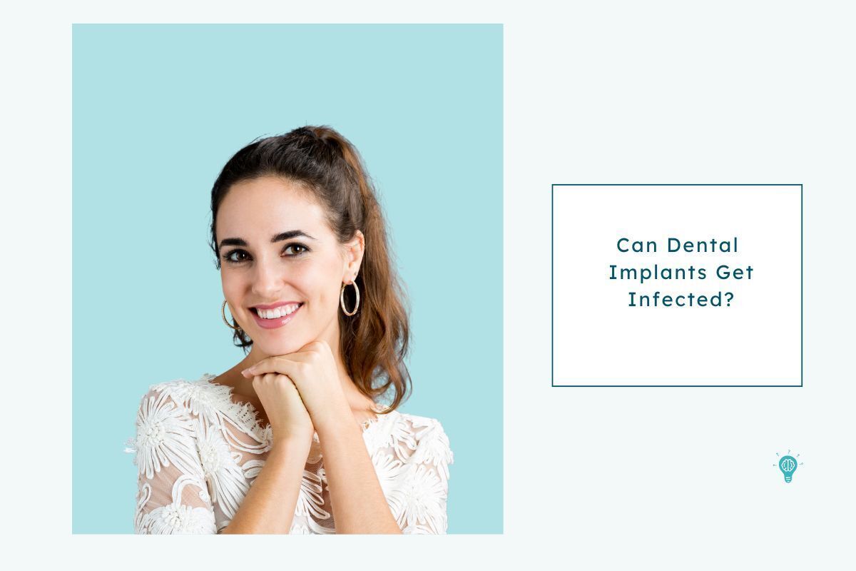Woman smiling with healthy teeth against turquoise background for dental implant infection article.
