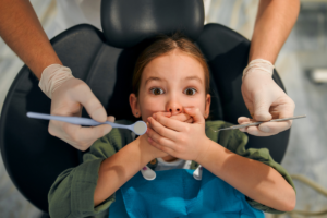 How a Pediatric Dentist Decides to Fill or Pull a Baby Tooth with a Cavity?